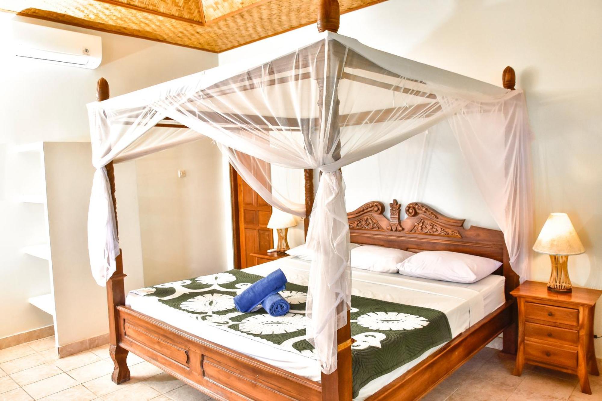 Ganesha Amed Hotel Phòng bức ảnh
