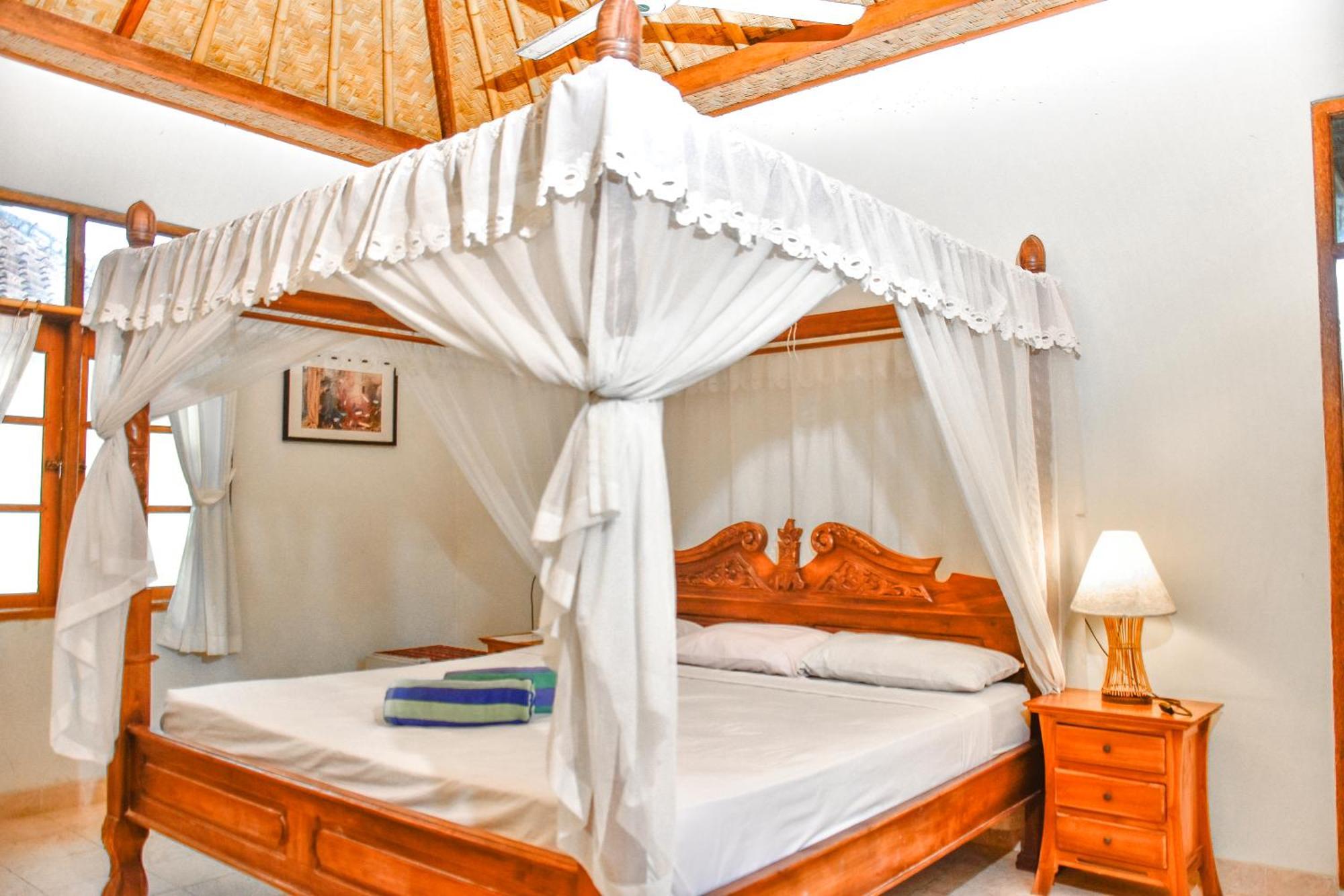 Ganesha Amed Hotel Phòng bức ảnh